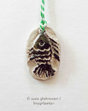 One-of-a-kind Handmade Ceramic ornaments by Susie Ghahremani