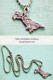 Chickadee Charm Necklace by Susie Ghahremani / boygirlparty.com