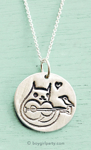 Silver Cat Necklace by Susie Ghahremani | Source: shop.boygirlparty.com